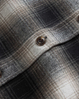 material shot of the buttons on The Maritime Shirt Jacket in Olive Plaid, Wovens by Taylor Stitch