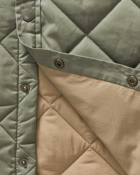 material shot of the buttons on The Miller Shirt Jacket in Smoked Olive Dry Wax, Outerwear by Taylor Stitch