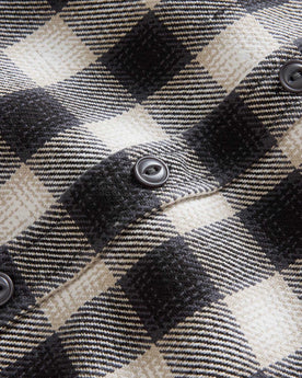 material shot of the buttons on The Moto Utility Shirt in White Smoke Plaid, Wovens by Taylor Stitch