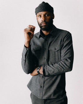 fit model posing in The Saddler Shirt in Ash Check Wool, Wovens by Taylor Stitch