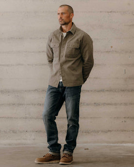 fit model posing in The Shop Shirt in Stone Chipped Canvas, Wovens by Taylor Stitch