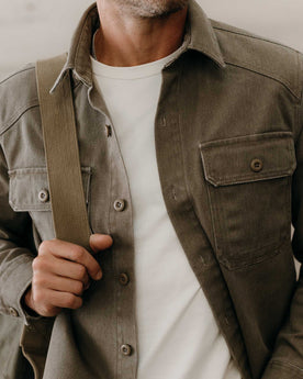 fit model showing off the details on The Shop Shirt in Stone Chipped Canvas, Wovens by Taylor Stitch