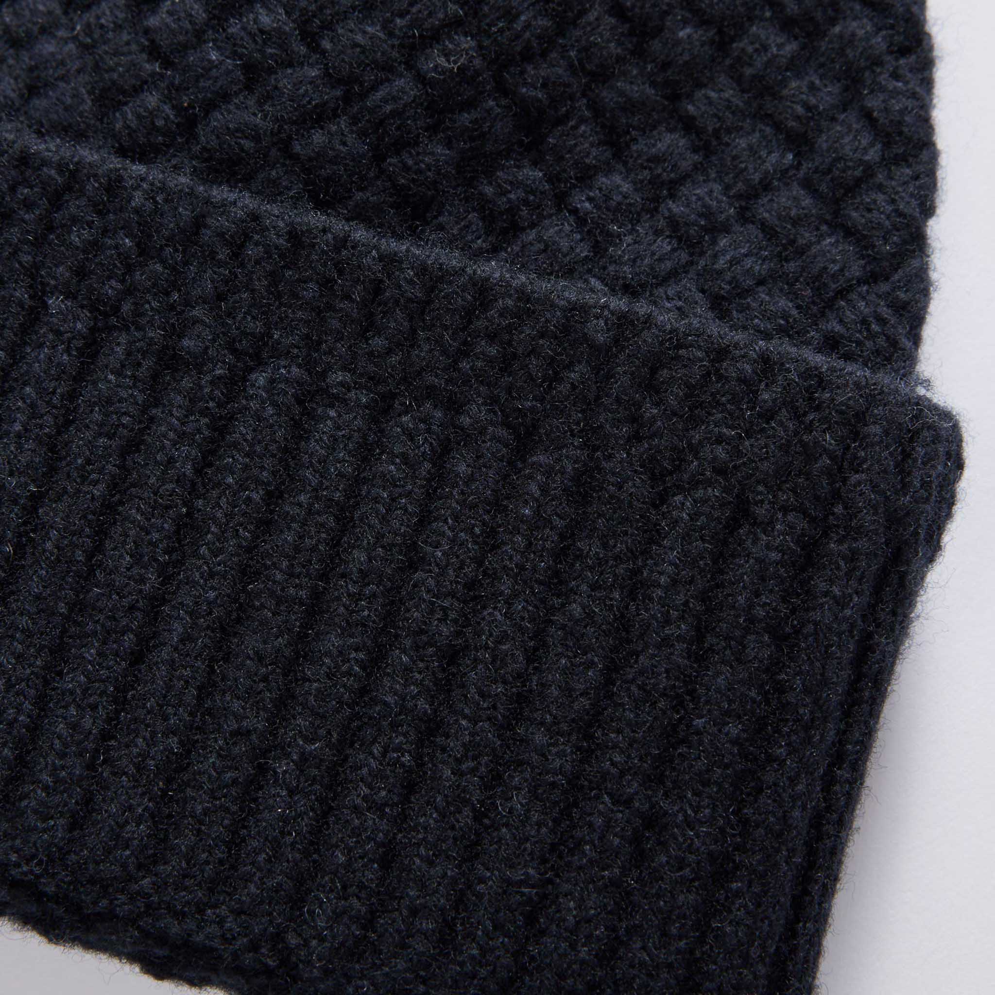material shot of the cuff on The Textured Knit Beanie in Heather Navy Merino, Accessories by Taylor Stitch