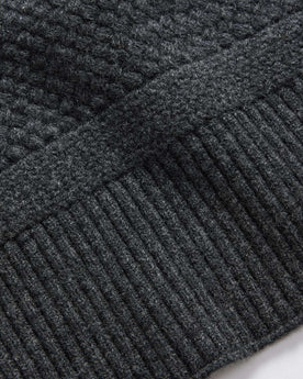 editorial image of the bottom edge of The Textured Knit Scarf in Heather Coal Merino, Accessories by Taylor Stitch
