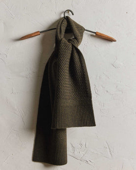 editorial image of The Textured Knit Scarf in Heather Loden Merino hanging, Accessories by Taylor Stitch