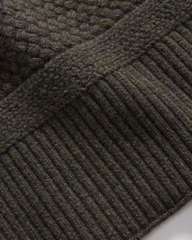 editorial flatlay of the cuff on The Textured Knit Scarf in Heather Loden Merino, Accessories by Taylor Stitch