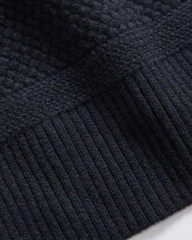 editorial image of the cuff on The Textured Knit Scarf in Heather Navy Merino, Accessories by Taylor Stitch