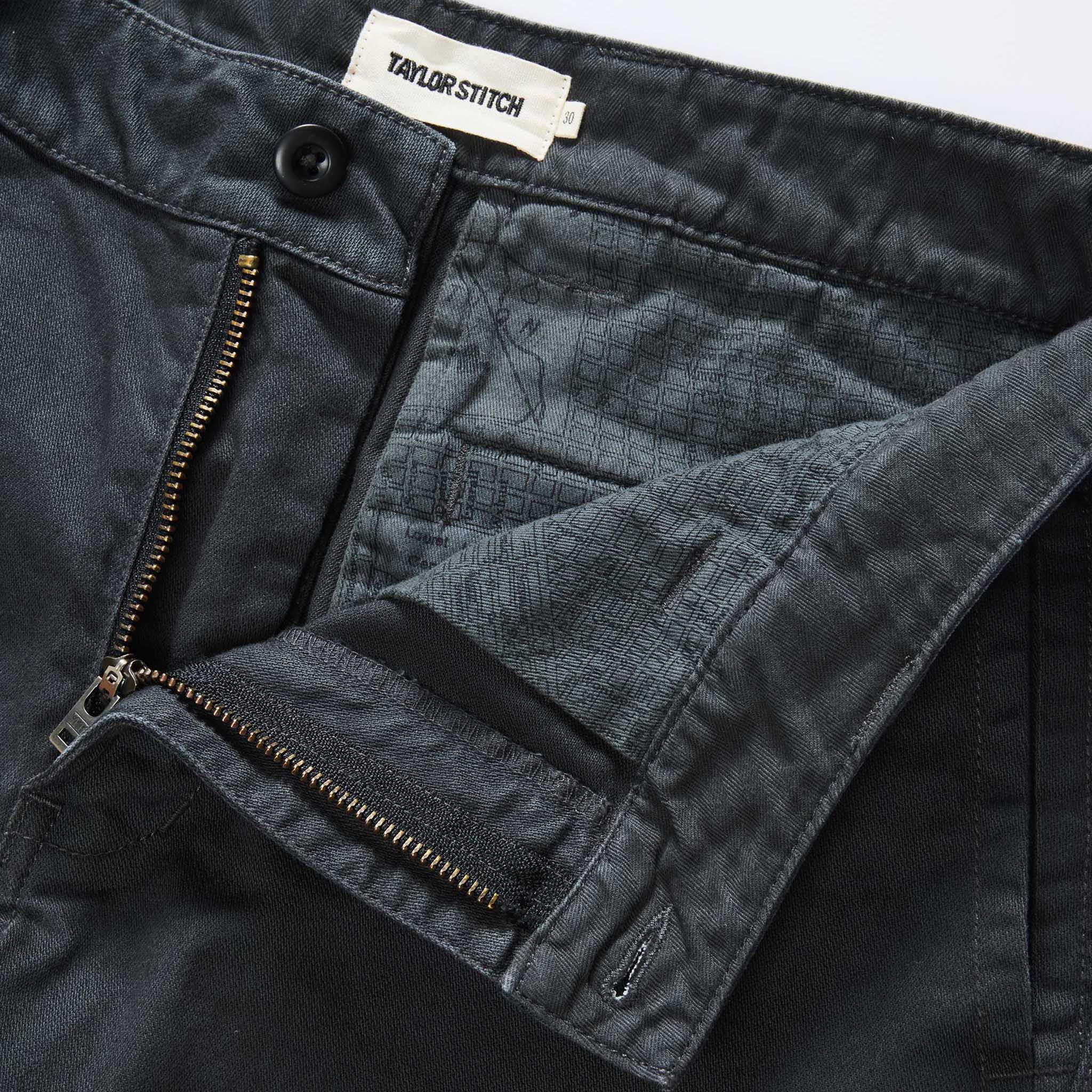 material shot of the zipper fly on The Tommie Pant in Faded Black, Bottoms by Taylor Stitch