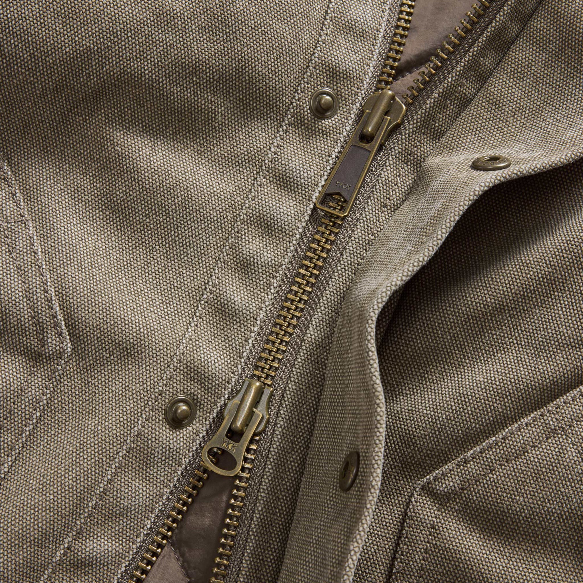 material shot of the zipper on The Workhorse Jacket in Stone Chipped Canvas, Outerwear by Taylor Stitch
