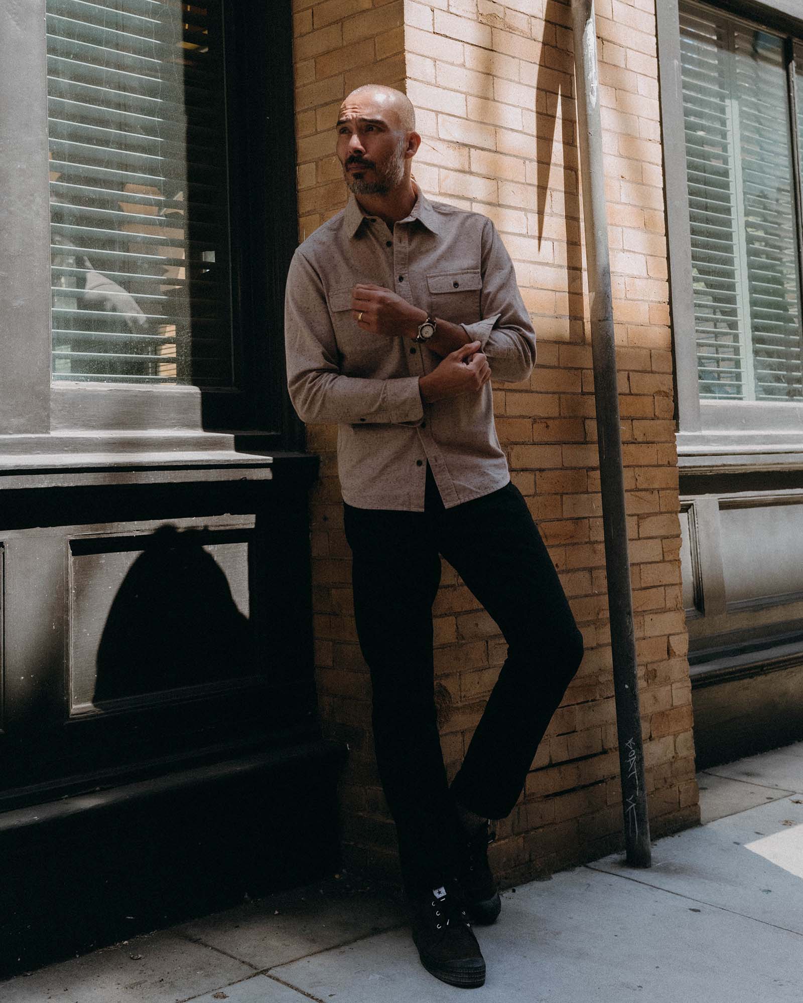 fit model standing wearing The Yosemite Shirt in Oat Donegal, Wovens by Taylor Stitch