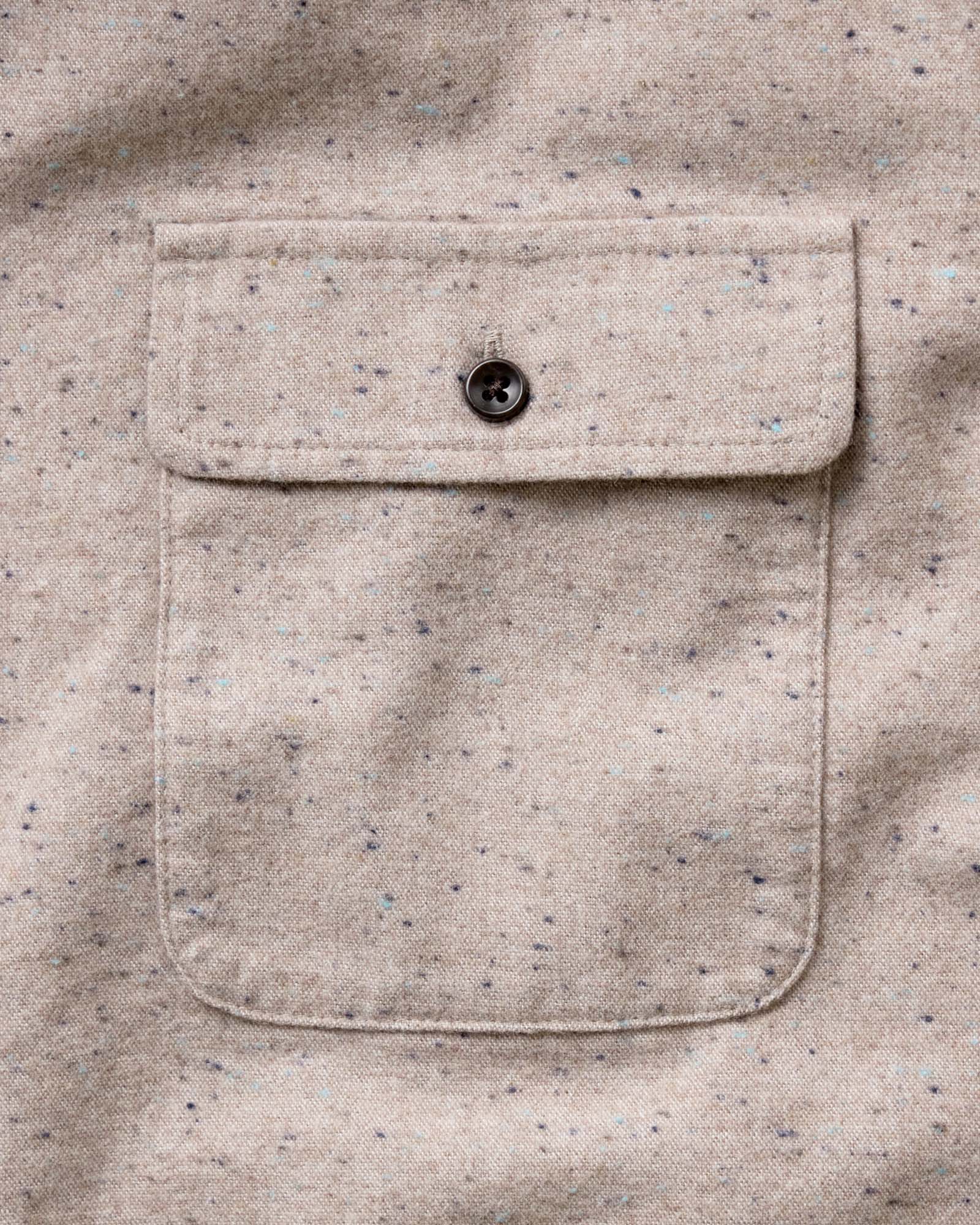material shot of the buttons on The Yosemite Shirt in Oat Donegal, Wovens by Taylor Stitch