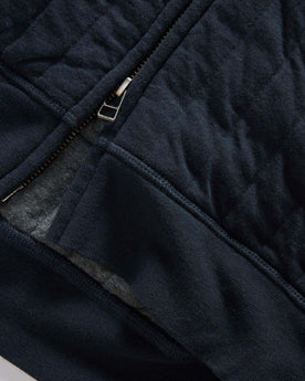 material shot of the zipper on The Apres Zip Hoodie in Heather Midnight Quilt, Knits by Taylor Stitch