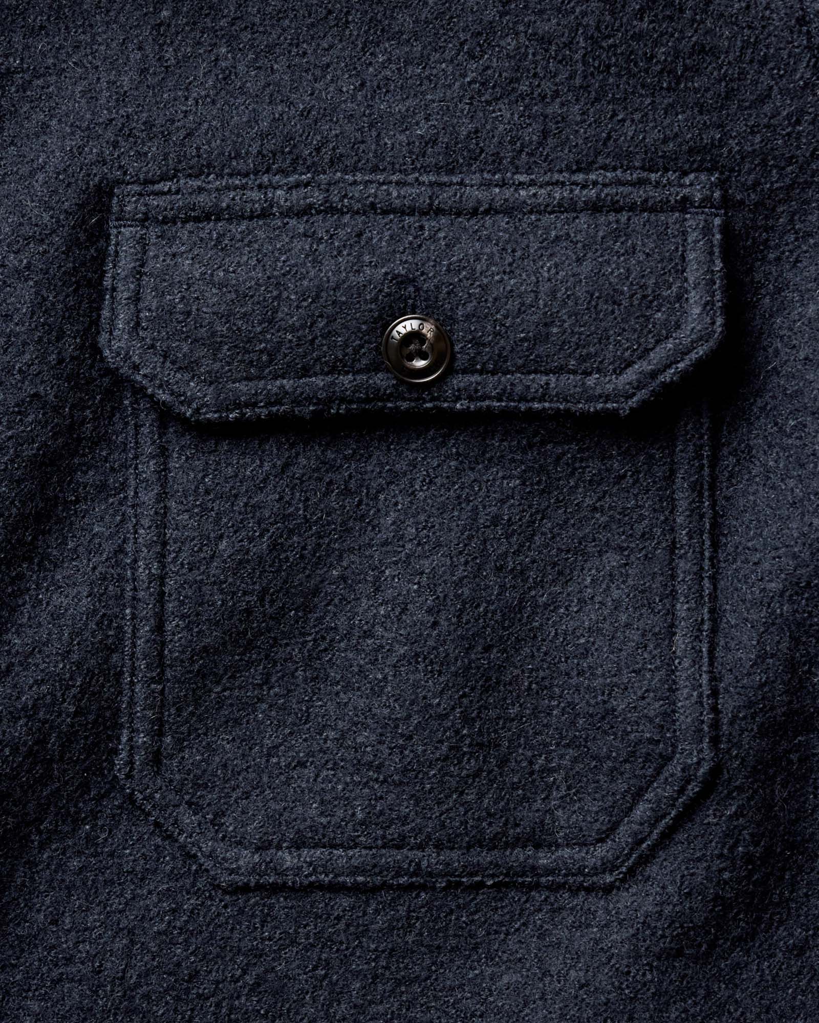 material shot of the collar on The Connor Overshirt in Dark Navy Boucle, Wovens by Taylor Stitch