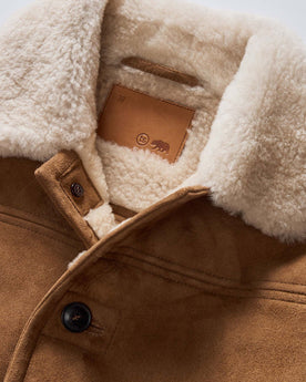 material shot of the collar on The High Plains Coat in Walnut Shearling, Outerwear by Taylor Stitch