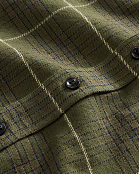 material shot of the buttons on The Ledge Shirt in Olive Plaid, Wovens by Taylor Stitch