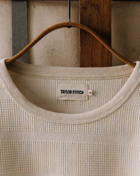 editorial image of The Morgan Crewneck in Natural Slub Stripe on a hanger, Knits by Taylor Stitch