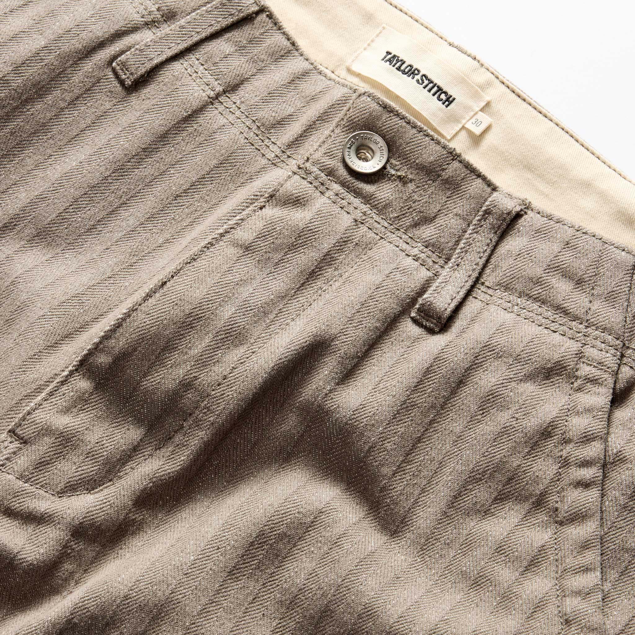 material shot of the waistband on The Morse Pant in Soil Herringbone, Bottoms by Taylor Stitch