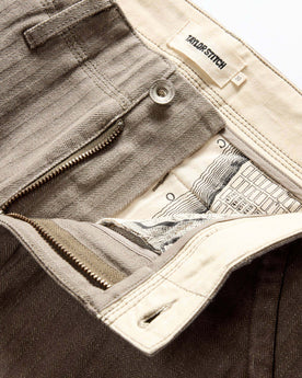 material shot of the zipper on The Morse Pant in Soil Herringbone, Bottoms by Taylor Stitch