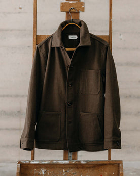 editorial image of The Ojai Jacket in Army Herringbone Wool hanging, Outerwear by Taylor Stitch