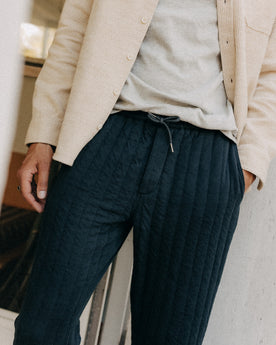 fit model showing off The Quilted Apres Pant in Heather Midnight Jersey, Bottoms by Taylor Stitch