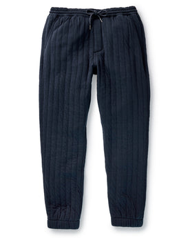 fit model showing cuffs on The Quilted Apres Pant in Heather Midnight Jersey, Bottoms by Taylor Stitch