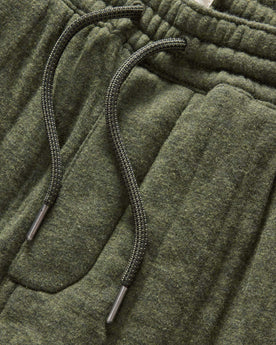 material shot of the waistband on The Quilted Apres Pant in Heather Fatigue Olive Jersey, Bottoms by Taylor Stitch