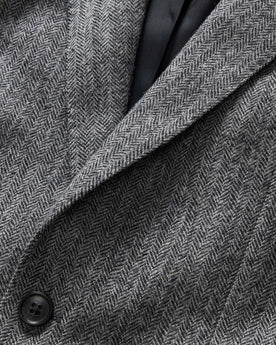 material shot of the collar and button on The Stevens Sportcoat in Slate Herringbone Wool, Outerwear by Taylor Stitch