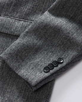 material shot of the side buttons on The Stevens Sportcoat in Slate Herringbone Wool, Outerwear by Taylor Stitch
