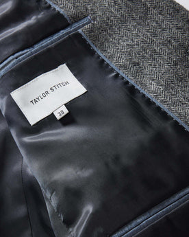 material shot of the inside pocket on The Stevens Sportcoat in Slate Herringbone Wool, Outerwear by Taylor Stitch