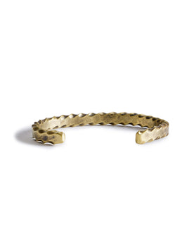 material shot of the back of The Twisted Cuff in Brass, Accessories by Taylor Stitch