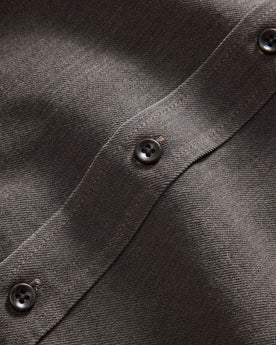 material shot of the buttons on The Utility Shirt in Soil Selvedge Denim, Wovens by Taylor Stitch
