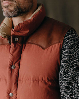 fit model posing in The Down Vest in Brick Red Waxed Ripstop, Outerwear by Taylor Stitch