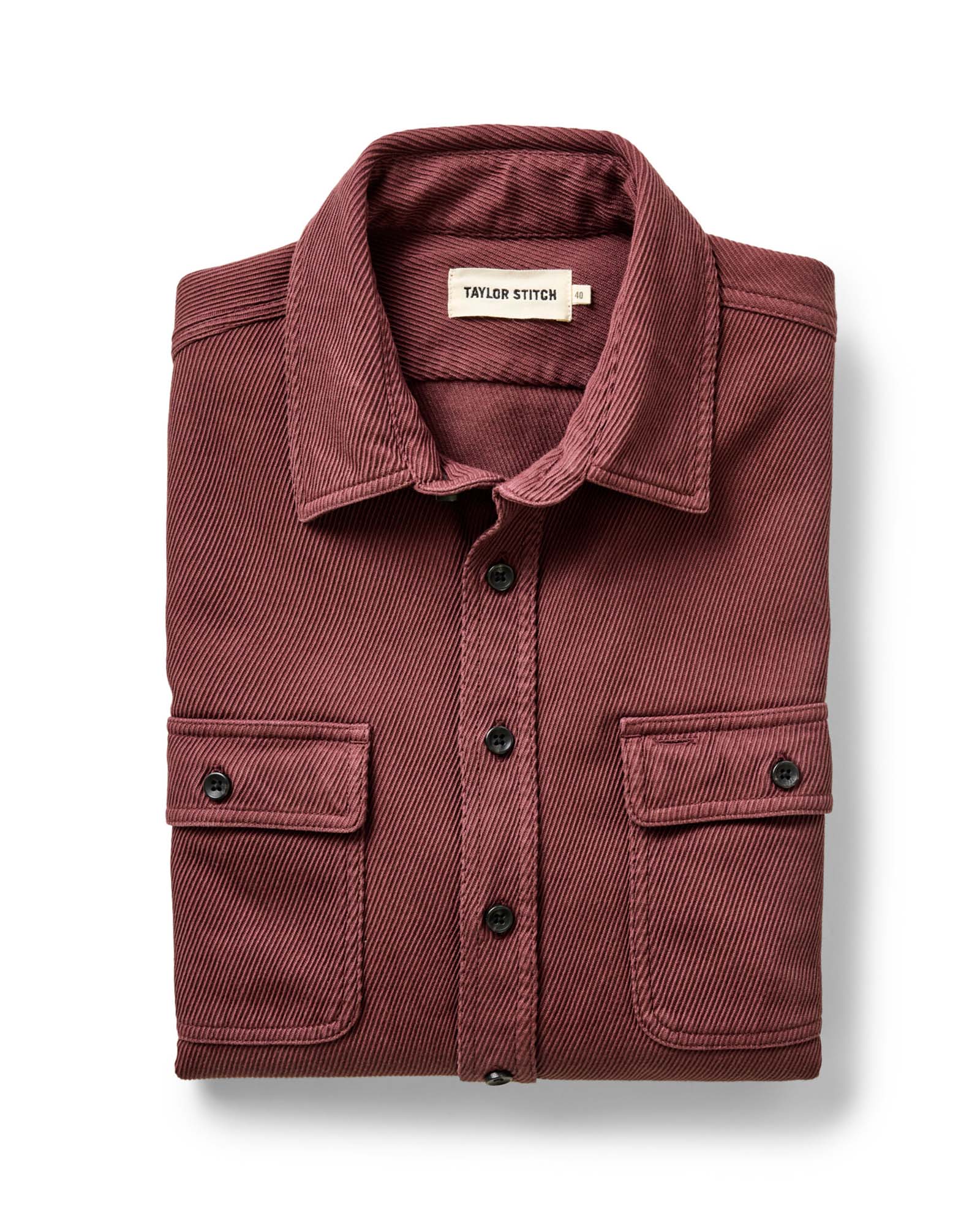 folded flatlay of The Ledge Shirt in Dried Cherry Twill, Wovens by Taylor Stitch