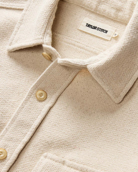 fit model walking showing off buttons on The Division Shirt in Birch, Wovens by Taylor Stitch