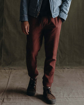 fit model posing in The Apres Pant in Burgundy Double Cloth, Bottoms by Taylor Stitch