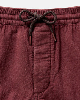 material shot of the waistband on The Apres Pant in Burgundy Double Cloth, Bottoms by Taylor Stitch
