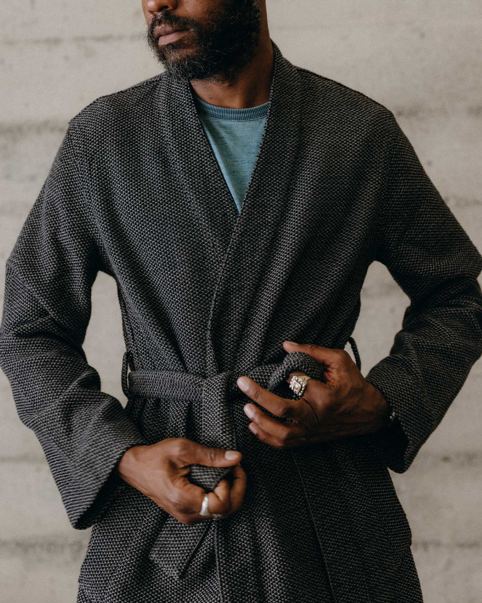 fit model adjusting the tie on The Apres Robe in Charcoal Sashiko, Accessories by Taylor Stitch