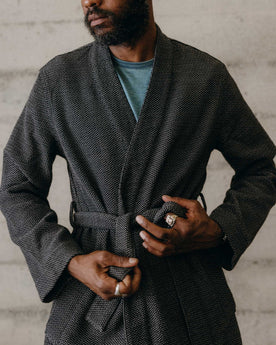 fit model adjusting the tie on The Apres Robe in Charcoal Sashiko, Accessories by Taylor Stitch