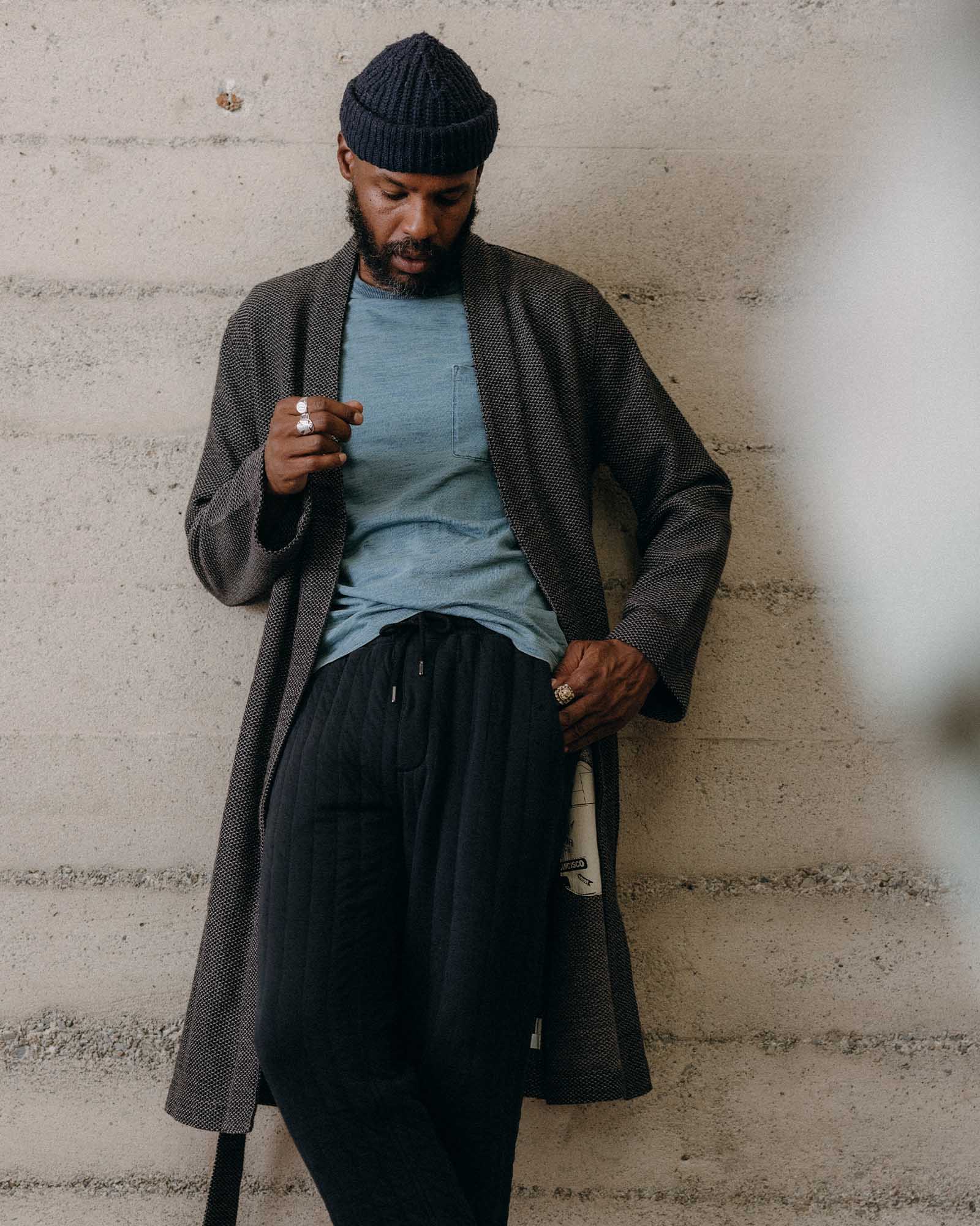 fit model leaning against the wall wearing The Apres Robe in Charcoal Sashiko, Accessories by Taylor Stitch