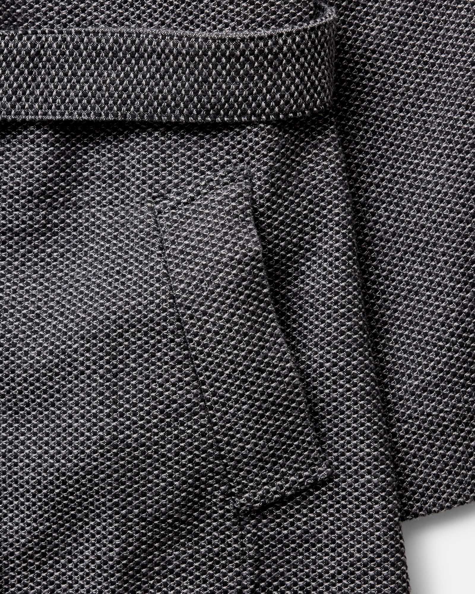 material shot of the pocket on The Apres Robe in Charcoal Sashiko, Accessories by Taylor Stitch
