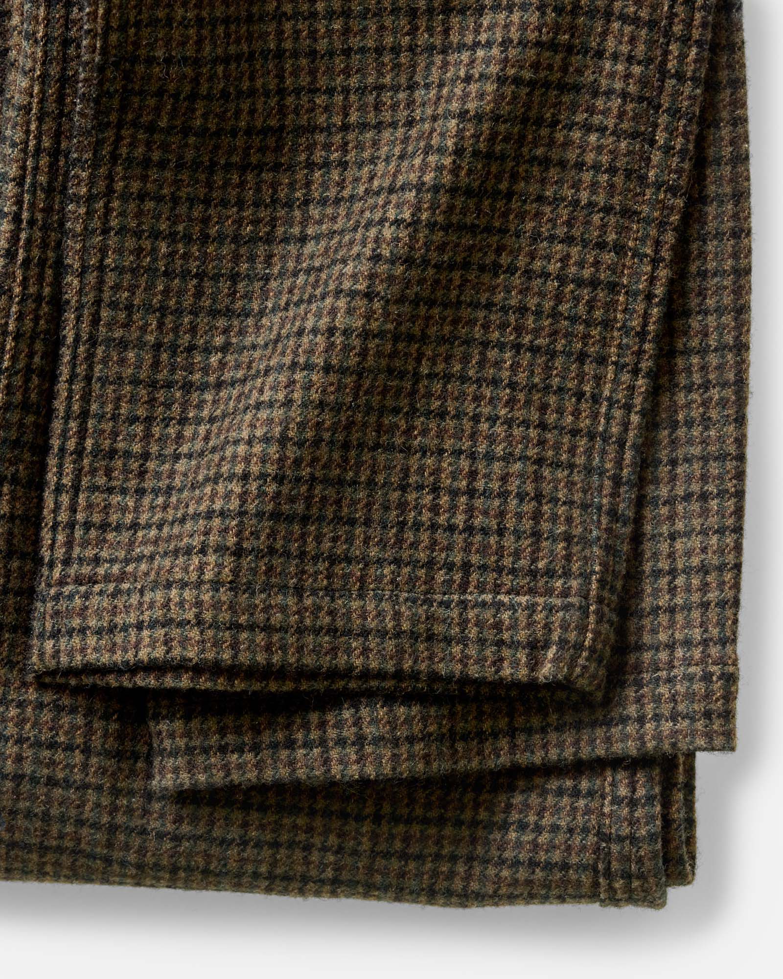 material shot of the hem on The Carmel Pant in Timber Guncheck Italian Wool, Bottoms by Taylor Stitch