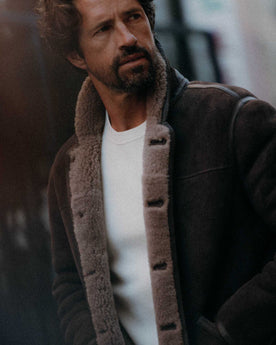fit model posing in The Coleman Jacket in Dark Chocolate Shearling Suede, Outerwear by Taylor Stitch