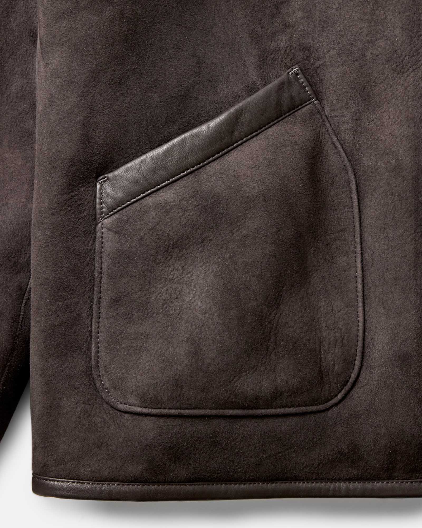 material shot of the pocket on The Coleman Jacket in Dark Chocolate Shearling Suede, Outerwear by Taylor Stitch