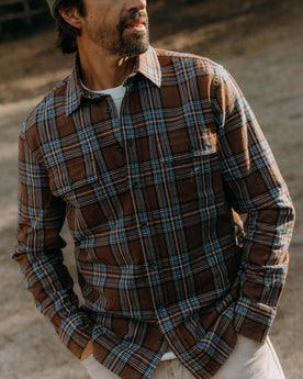 fit model posing in The Craftsman Shirt in Brick Plaid, Wovens by Taylor Stitch