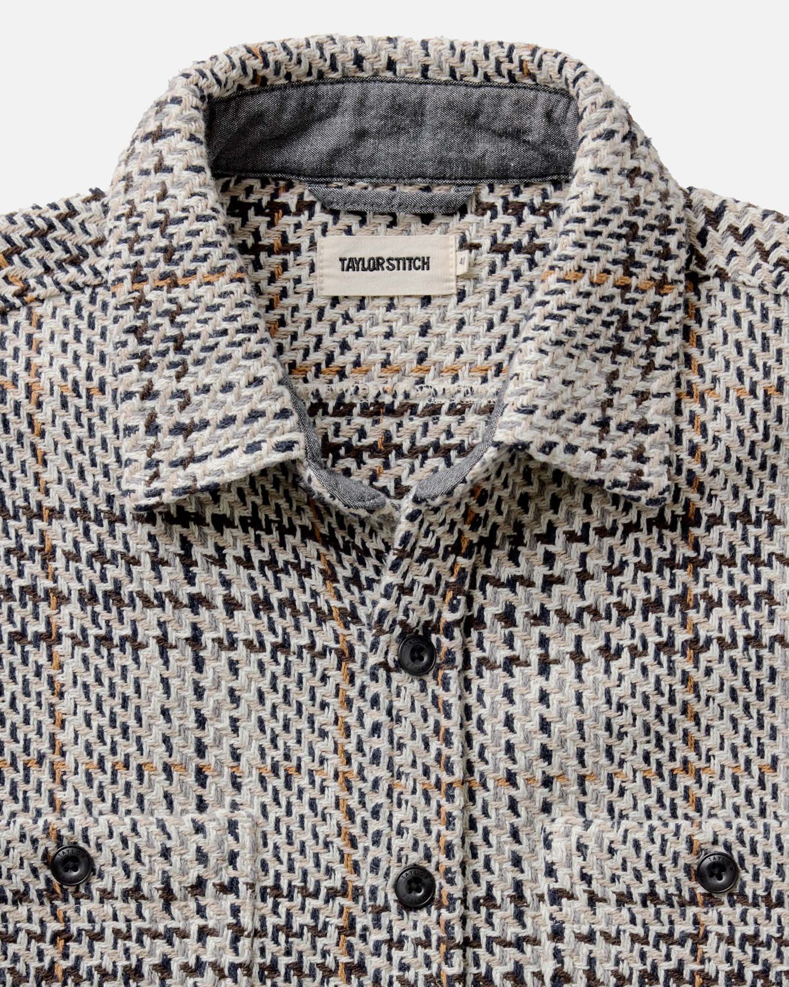 material shot of the collar on The Cutter Overshirt in Stone Plaid, Wovens by Taylor Stitch
