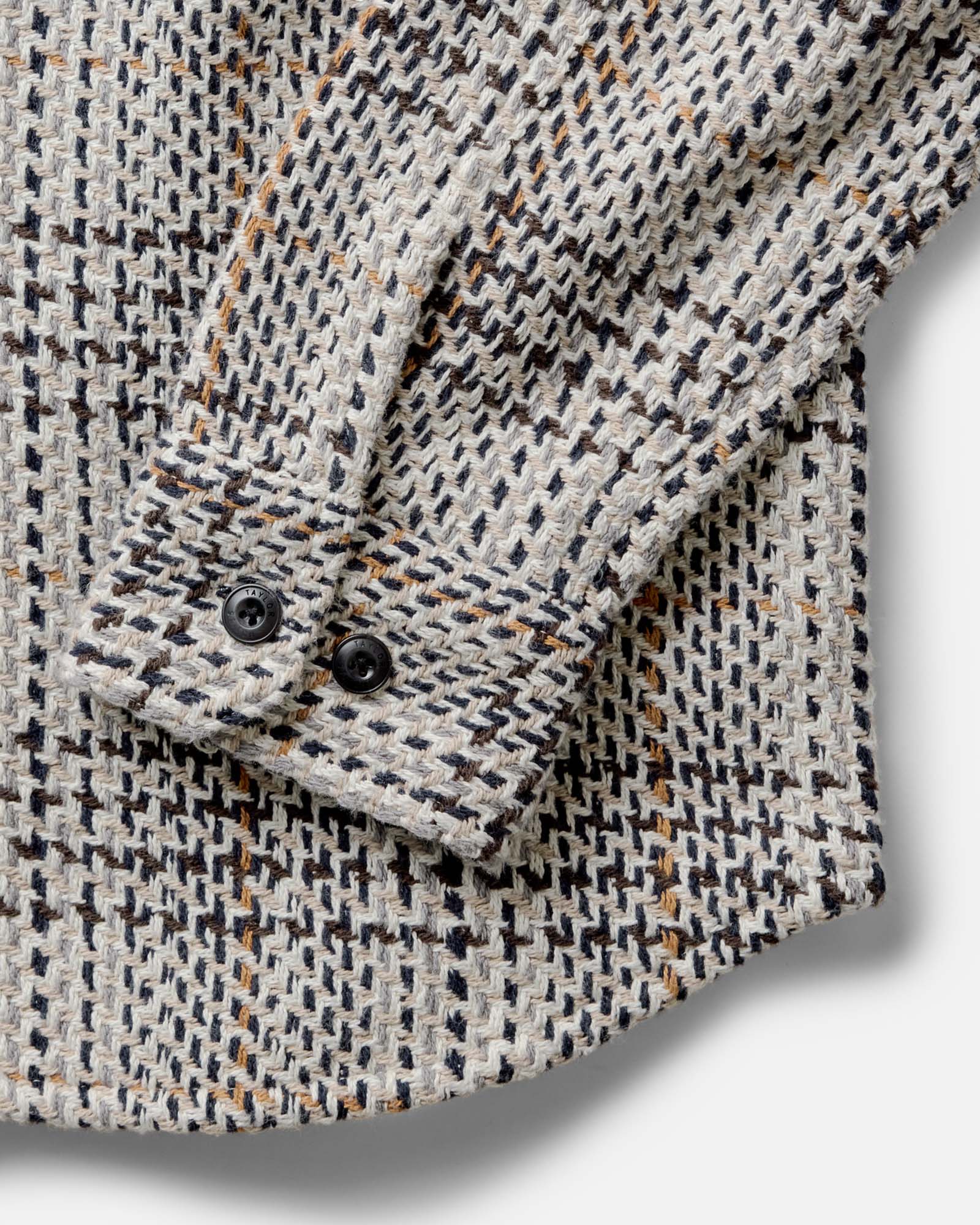 material shot of the sleeve on The Cutter Overshirt in Stone Plaid, Wovens by Taylor Stitch