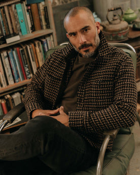 fit model sitting wearing The Cutter Overshirt in Timber Plaid, Wovens by Taylor Stitch