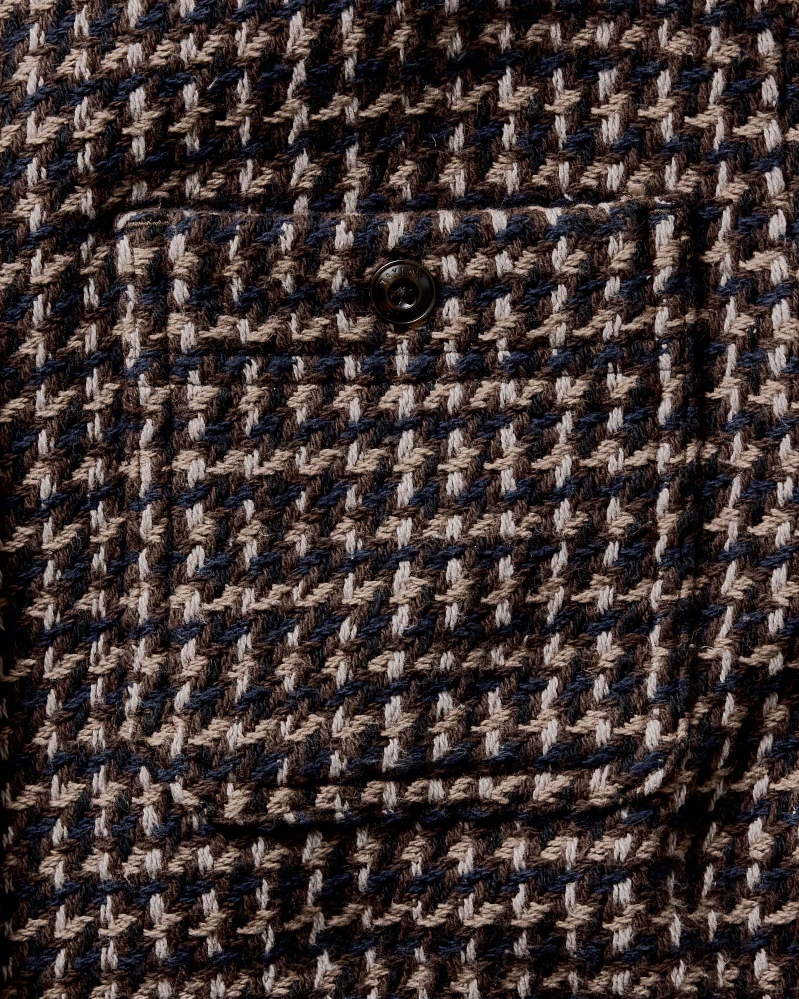 material shot of the pocket on The Cutter Overshirt in Timber Plaid, Wovens by Taylor Stitch