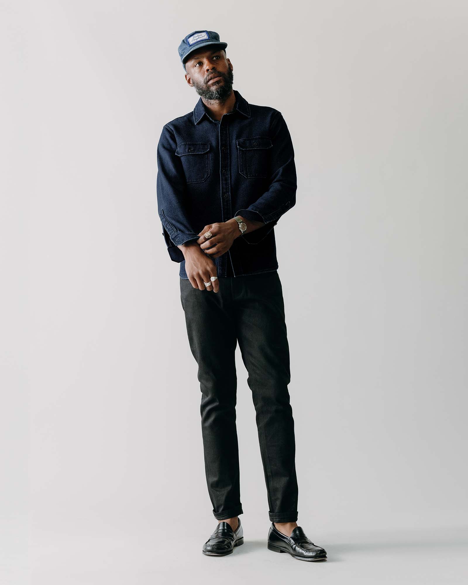 fit model posing in The Division Shirt in Rinsed Indigo, Wovens by Taylor Stitch