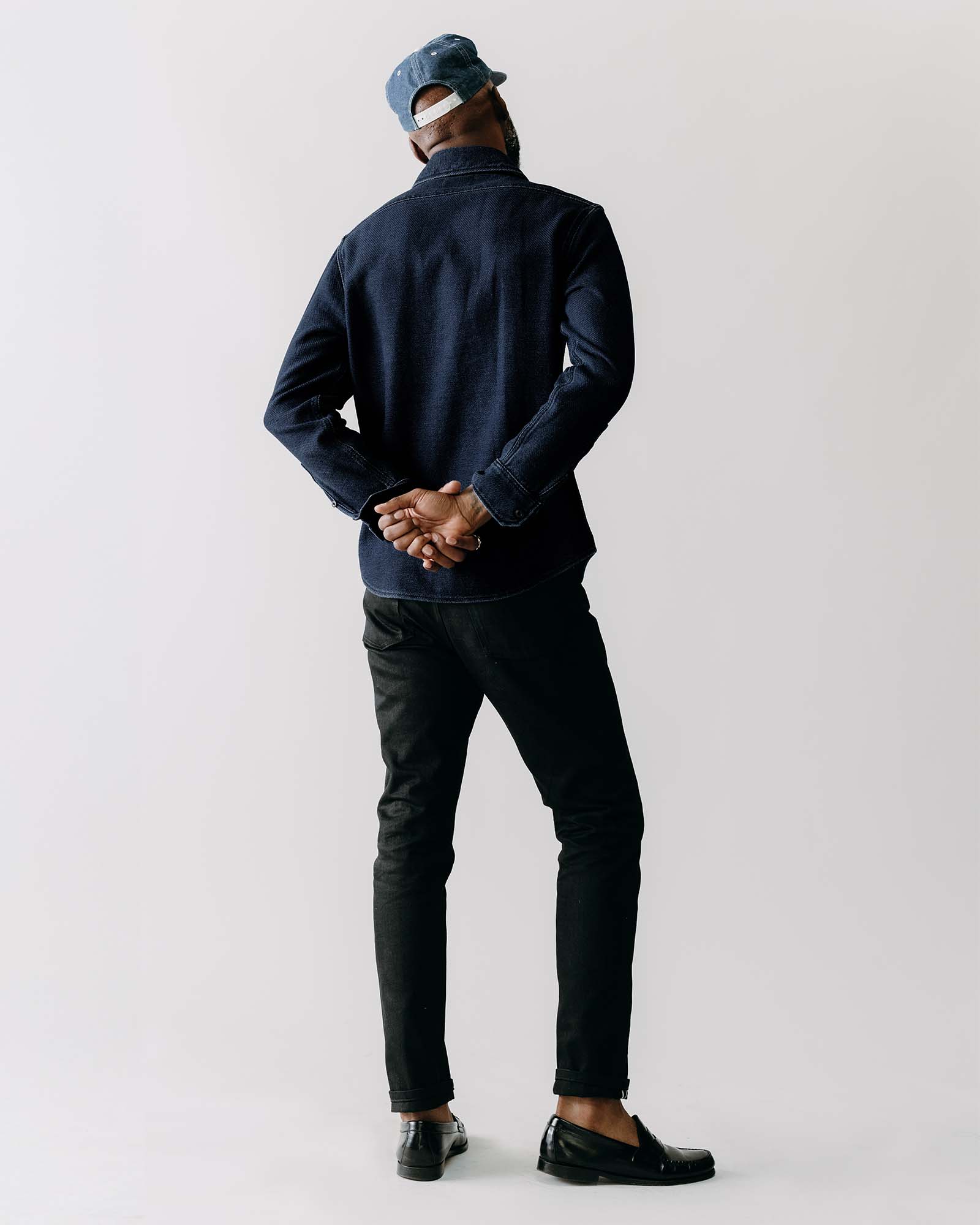 fit model showing off the back of The Division Shirt in Rinsed Indigo, Wovens by Taylor Stitch
